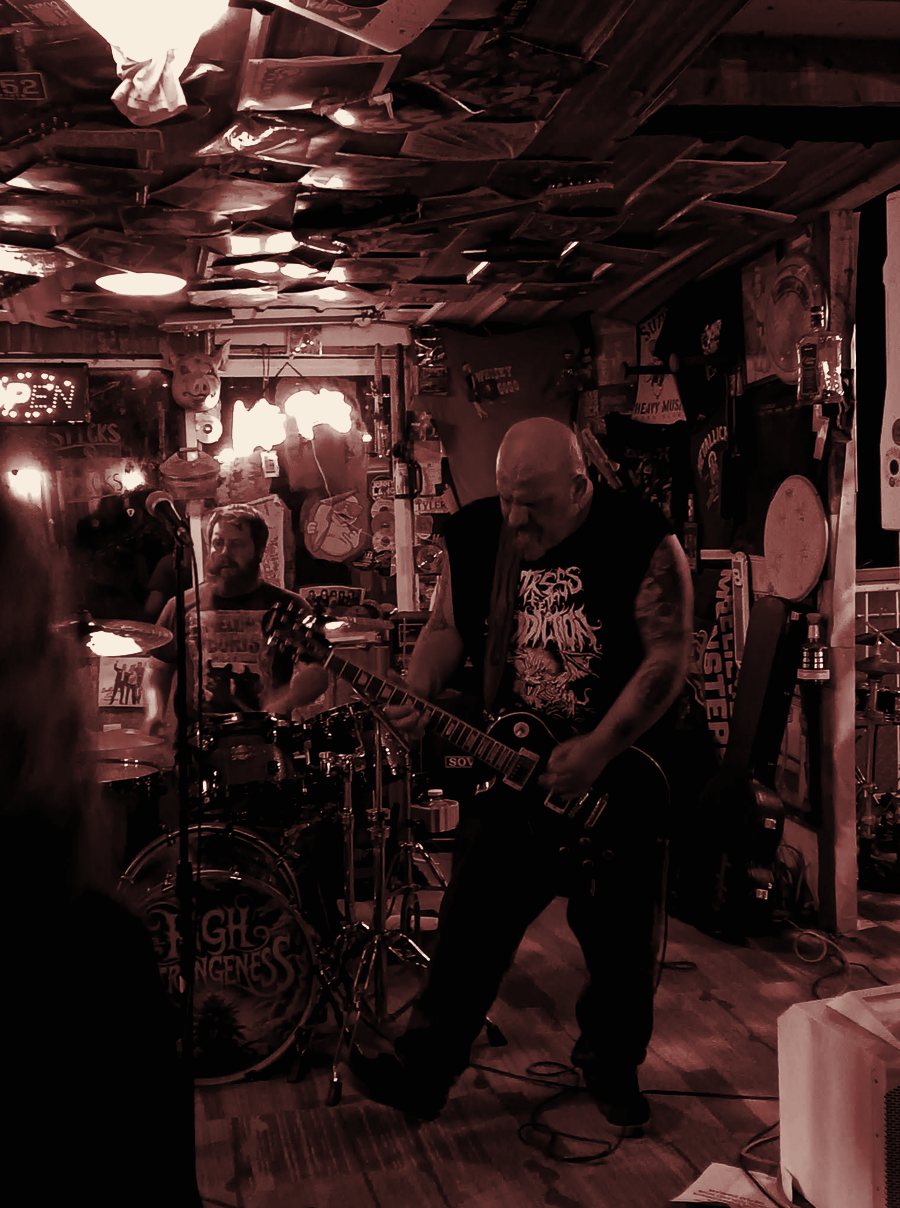 Justin playing a Les Paul at Flying Z Farms